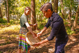 Rachel Chong and Len Pierre with stqayeʔ q̓əwət (Wolf Drum) in Cedar Grove - O3A6429